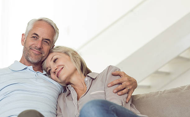 istock Relaxed mature couple sitting on sofa 538623723