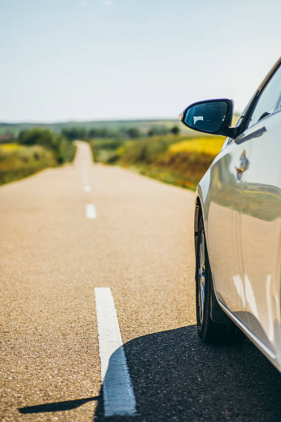 istock Countryside road and car 538641226