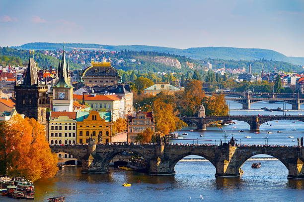 istock Vltava River and Charle bridge with red foliage 538641714