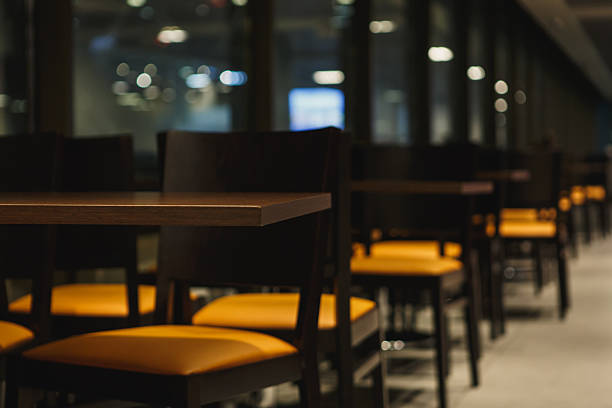 istock rows of tables and chairs in the cafe 538642008