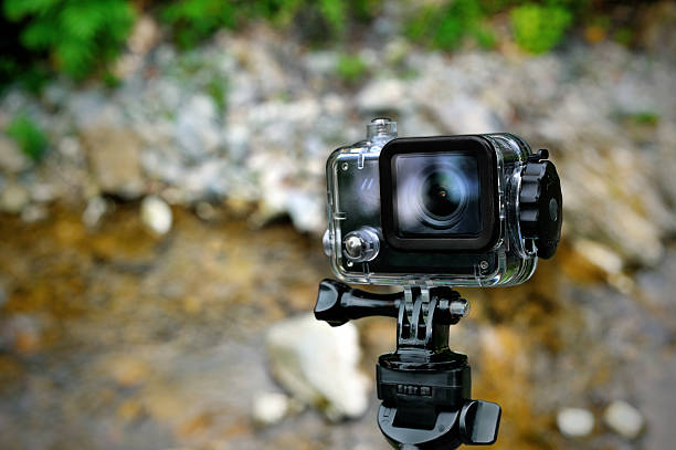 istock Action camera with aqua box on nature background 538642322