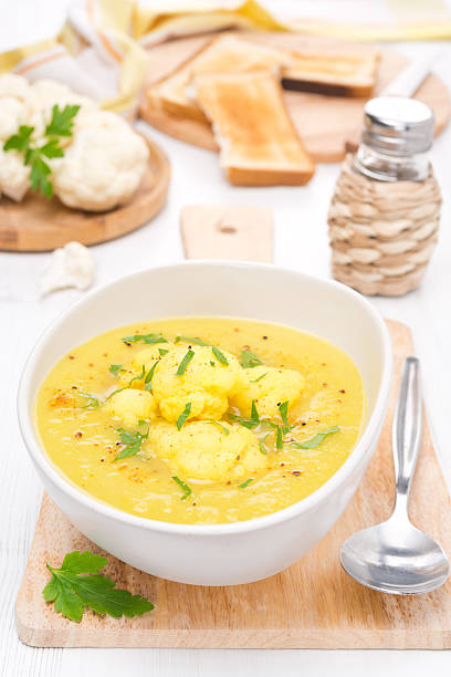 istock cauliflower soup with curry in a bowl 538644709