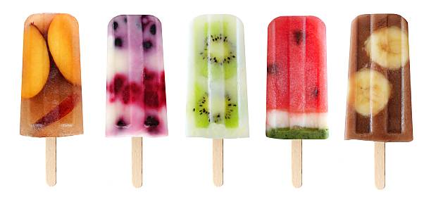 Variety of fruit popsicles isolated on white Five assorted fruit popsicles isolated on a white background flavored ice photos stock pictures, royalty-free photos & images