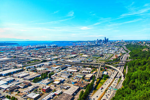 An aerial wide angle view of the skyline of Seattle, Washington showing Interstate 5 leading to the downtown area.  