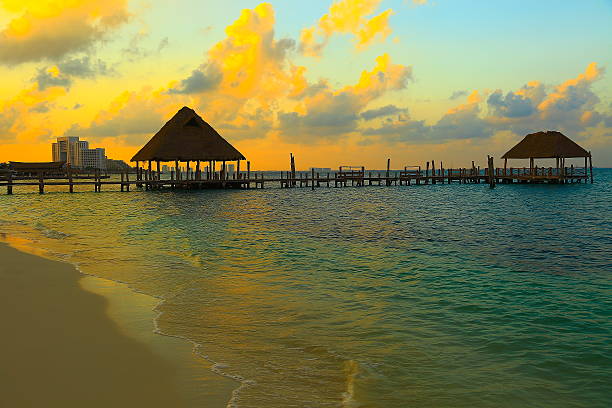 istock Gazebo palapas, beach dramatic sunset - Cancun, caribbean tropical paradise 538645508