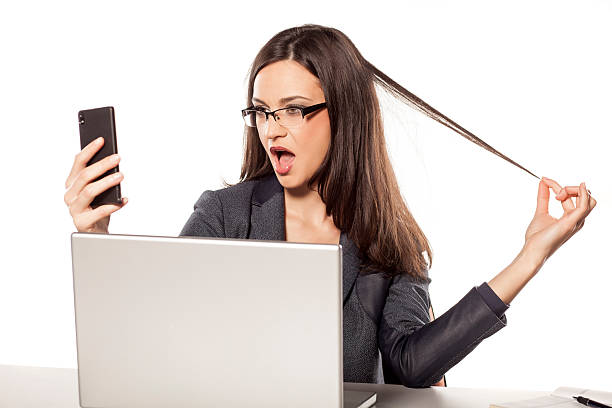 istock Young businesswoman making selfie at her workplace 538646033