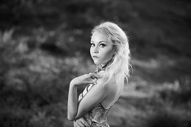 istock Blonde model posing outdoor in black and white 538647349