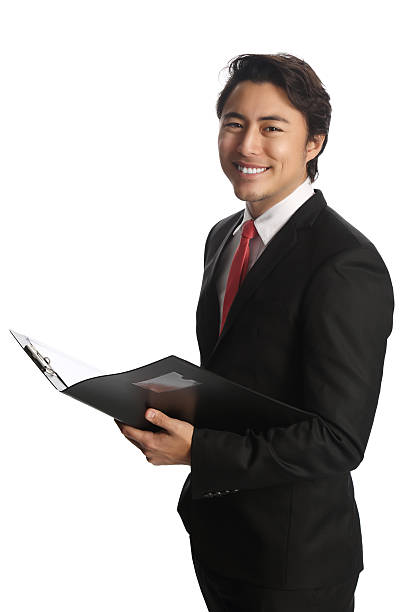 istock Businessman with clipboard smiling 538647942