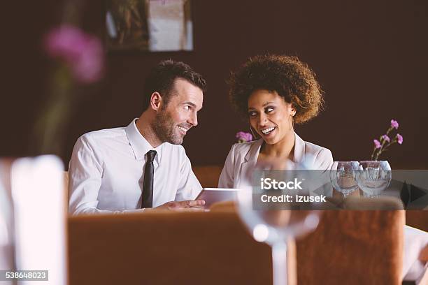 Businesswoman And Businessman On Lunch Stock Photo - Download Image Now - Women, Dinner, Elegance