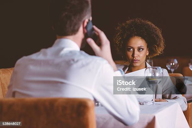 Two Business People On Lunch Stock Photo - Download Image Now - Bar - Drink Establishment, Couple - Relationship, Serious