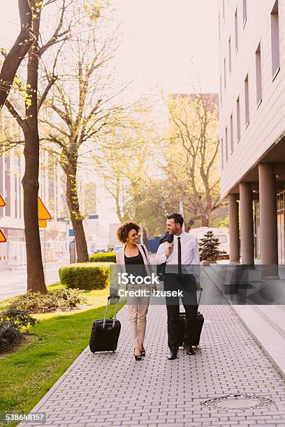 Businessman And Businesswoman On Business Travel Stock Photo - Download Image Now - African Ethnicity, African-American Ethnicity, Business