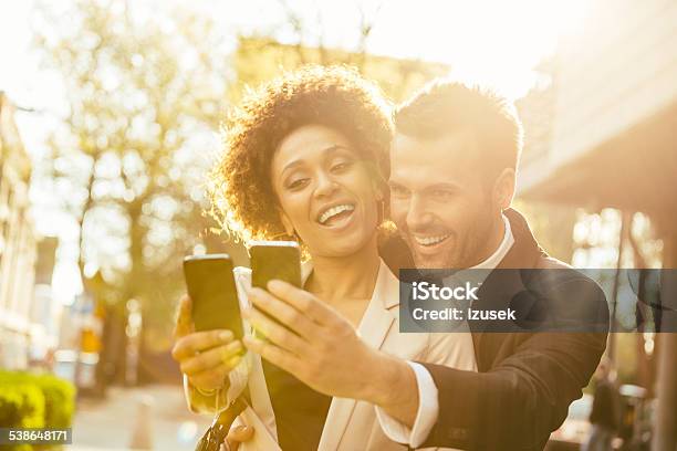 Two Business People Taking Selfie Stock Photo - Download Image Now - 2015, Adult, Adults Only