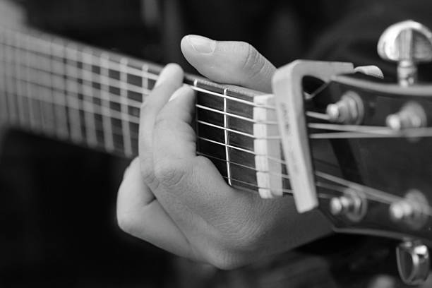 istock close up guitar ,play music concept 538648295