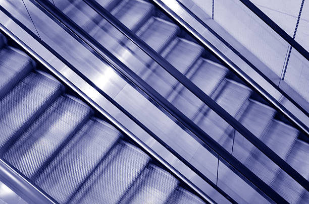 istock Two escalators, one goes up and one goes down 538648438