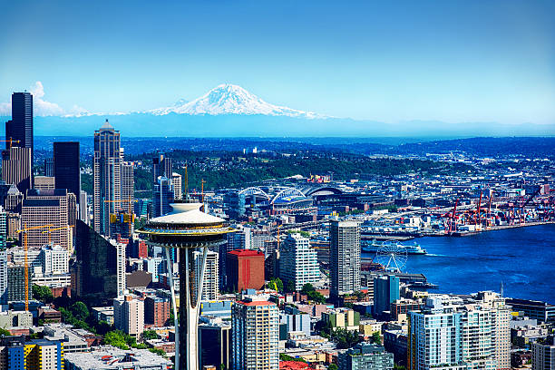 Seattle Skyline from Above Aerial shot of the skyline of Seattle, Washington shot during a helicopter photo flight.   puget sound aerial stock pictures, royalty-free photos & images