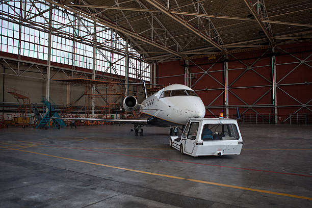 istock Business jet airplane stays in hangar.. 538651795