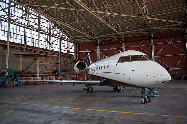 istock Business jet airplane stays in hangar.. 538651889