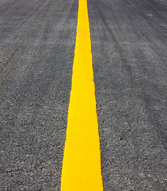istock Asphalt surface of the road with a yellow line. 538652368