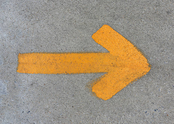 istock The Yellow arrow on floor street background 538653591