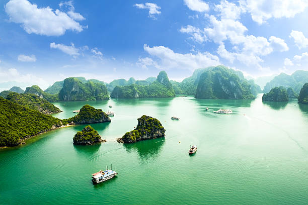 HALONG bay in vietnam HALONG bay in vietnam. UNESCO World Heritage Site. This view from TiTop island and its most popular view for travel in Halong bay. hanoi stock pictures, royalty-free photos & images