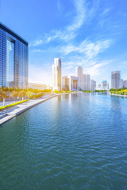 istock Modern buildings and river in urban city 538659898