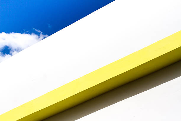 Element of the original building against a clear blue sky. Architectural background