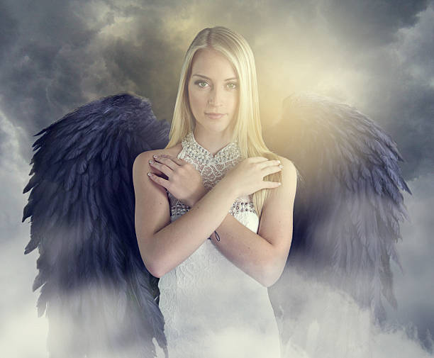 istock Attractive angel with black wings 538661706