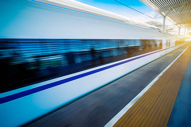 istock high-speed train at the railway station,motion blurred. 538662502