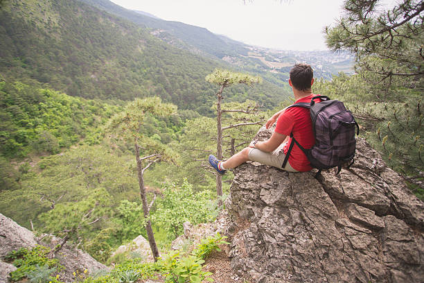 istock Hiker resting on a top of mountain 538662532