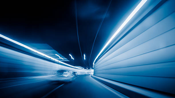 istock motion blurred car in tunnel 538663438