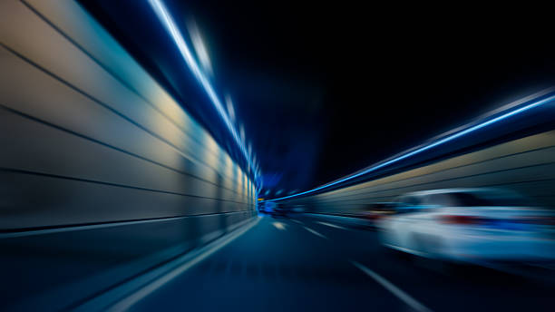 istock motion blurred car in tunnel 538663658