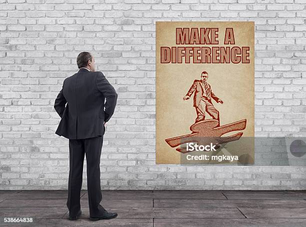 Businessman And Vintage Style Make A Difference Poster Stock Photo - Download Image Now