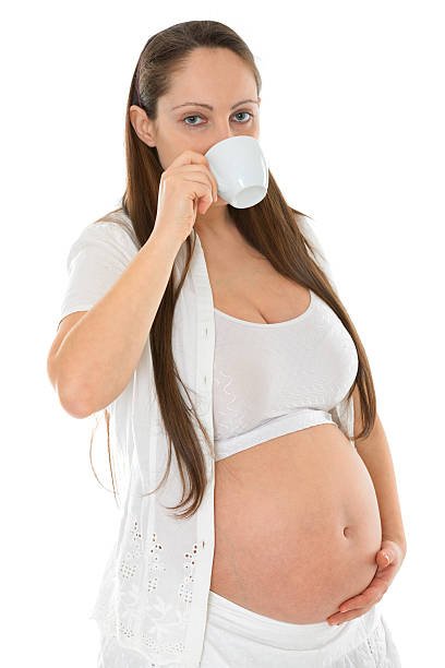 istock Pregnant woman drinking coffee 538667238