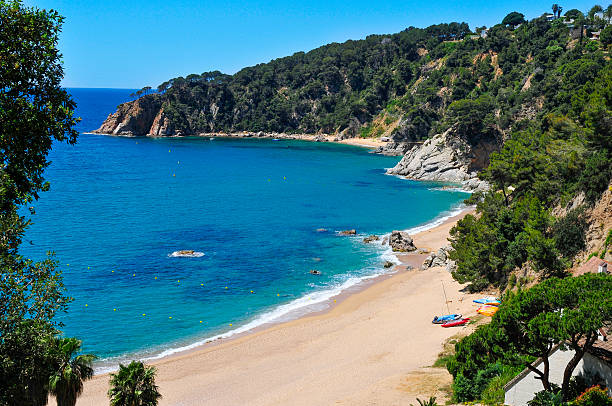 istock coves of Cala Llorell in Tossa de Mar, Spain 538667406
