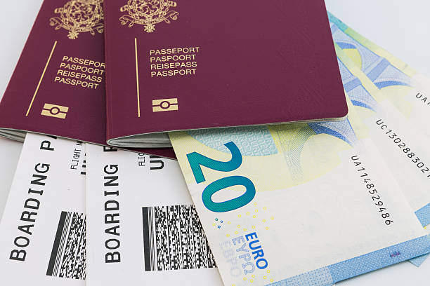 istock Euro Bills with passport and boarding pass 538668366