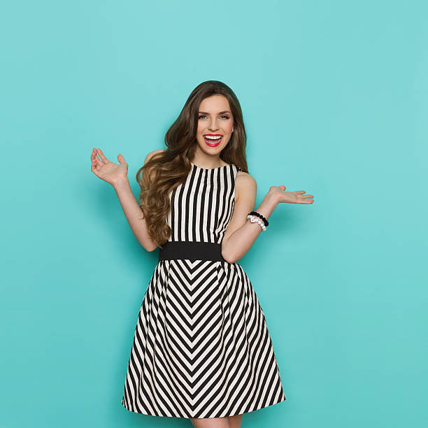 istock Laughing Elegant Woman With Arms Outstretched 538668530