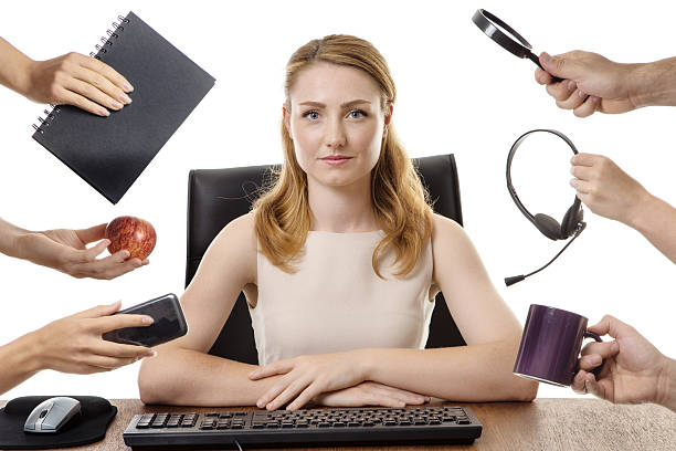 istock business woman sitting at desk 538668764
