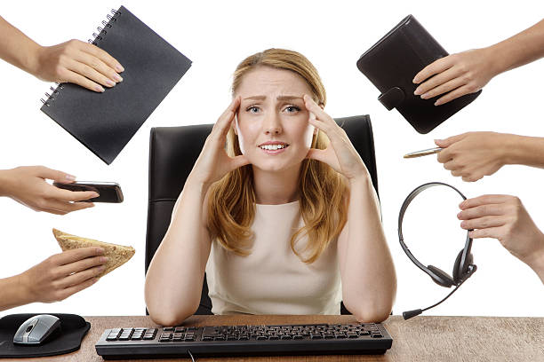istock business woman sitting at desk 538668878