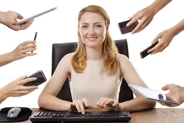 istock business woman sitting at desk 538669080