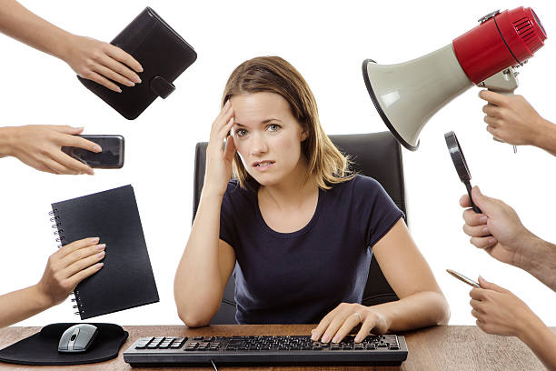 istock business woman sitting at desk 538669308