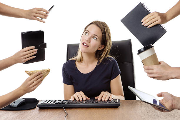 istock business woman sitting at desk 538669624