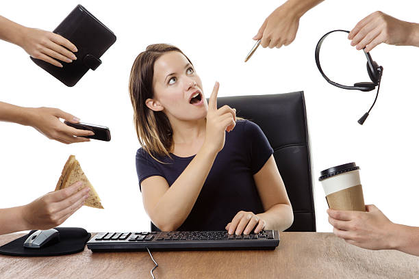 istock business woman sitting at desk 538669766