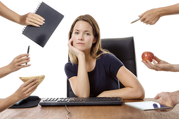 istock business woman sitting at desk 538669818