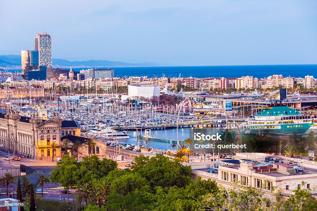 Skyline Barcelona at sunset Panoramic view of Barcelona with Port  Ancient Stock Photo