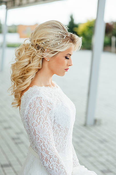istock Beautiful young bride in luxury wedding dress 538671346