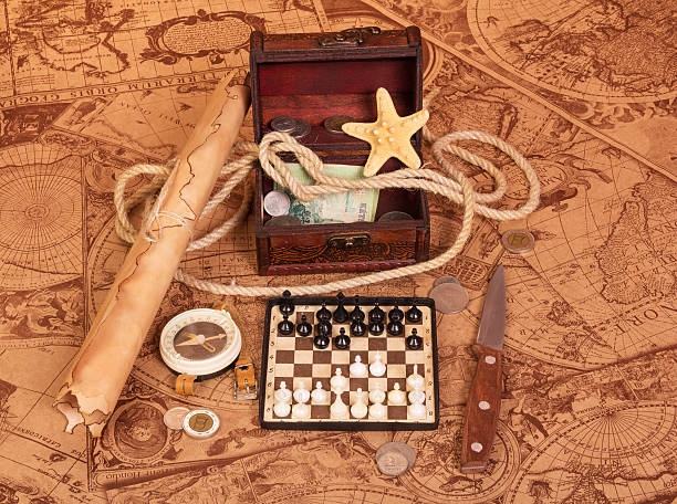 Travel Accessories Scroll Compass Chess Treasure Trove Of Antique Maps  Stock Photo - Download Image Now - iStock