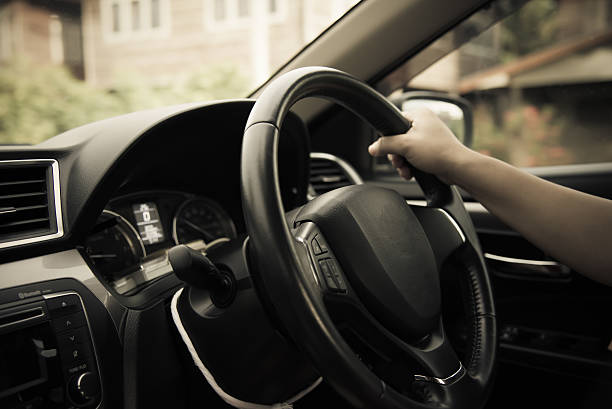 istock Women drive car in black. 538673652