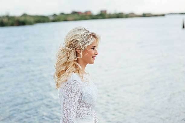 istock Beautiful young bride in luxury wedding dress 538674564