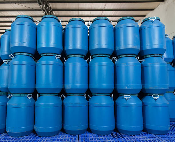 istock Plastic barrels or drums stored in a warehouse 538679126