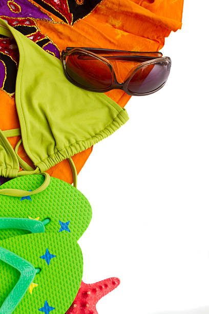 istock sandals ans swimming suit on towel 538681577